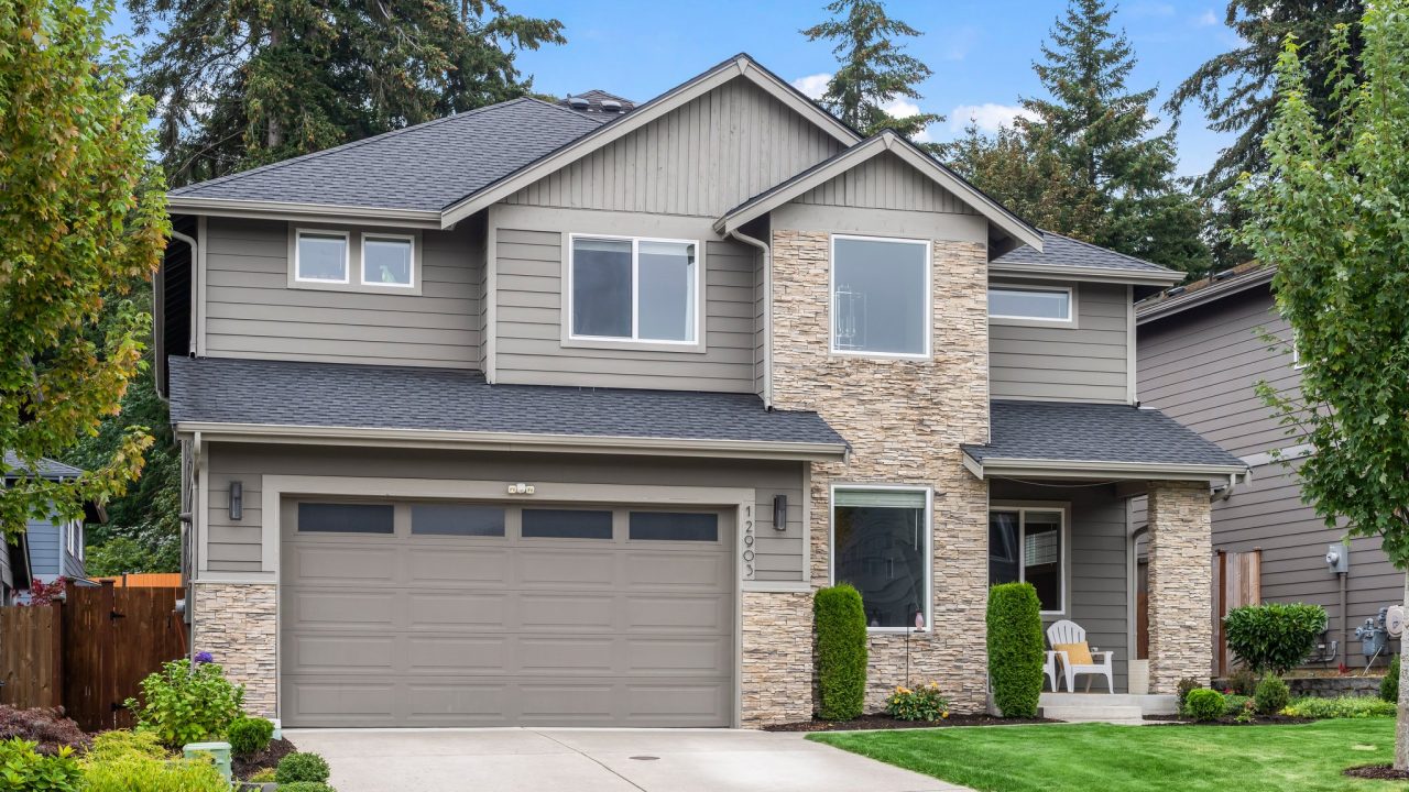 beautiful home with mature landscaping